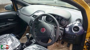 Fiat Punto facelift in all black interiors. Dashboard is similar to the Linea facelift.