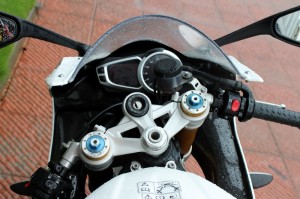 Digital + analogue instrument cluster and clip-on handlebars