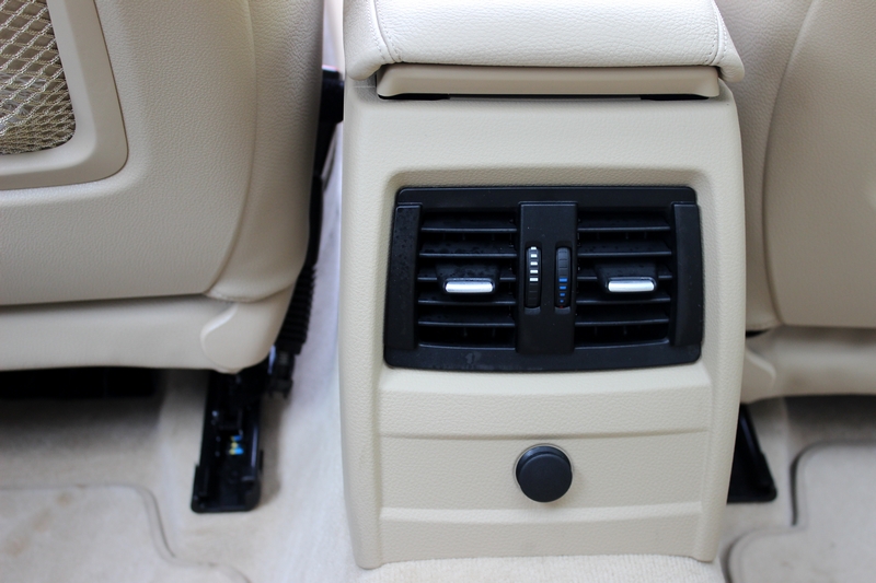 Rear AC vents and a charging point