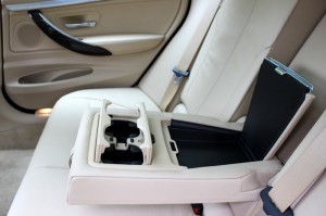 Rear seat centre armrest with two cup holders and a storage cubicle