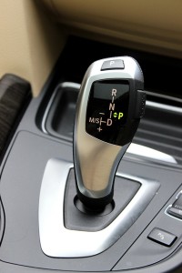 Gear lever fits in your hands perfectly. Press the unlock button on the side to shift gears.