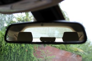Inside rear view mirror covers all of the small rear windscreen area