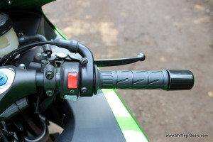 Track spec short throttle cables. RHS control switch houses the kill-switch and the electric starter.