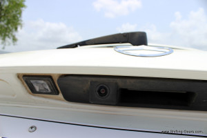 Rear view camera tucked under the Mercedes logo
