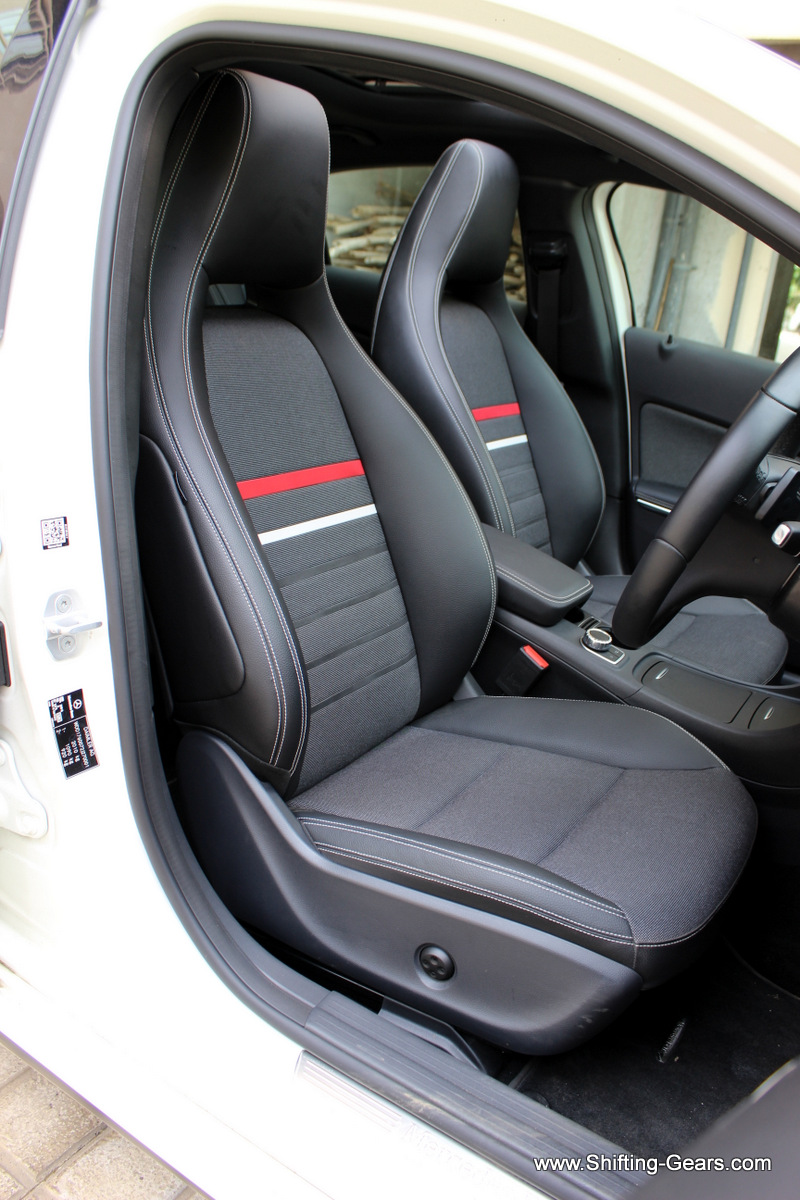 Full leather upholstery seen on the petrol variants, here, it is a mix of fabric + art leather