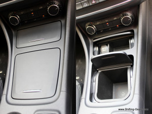 Centre console storage bins are neatly covered with a lid