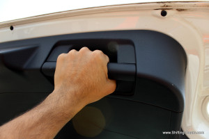 Grab handle to pull down the boot lid