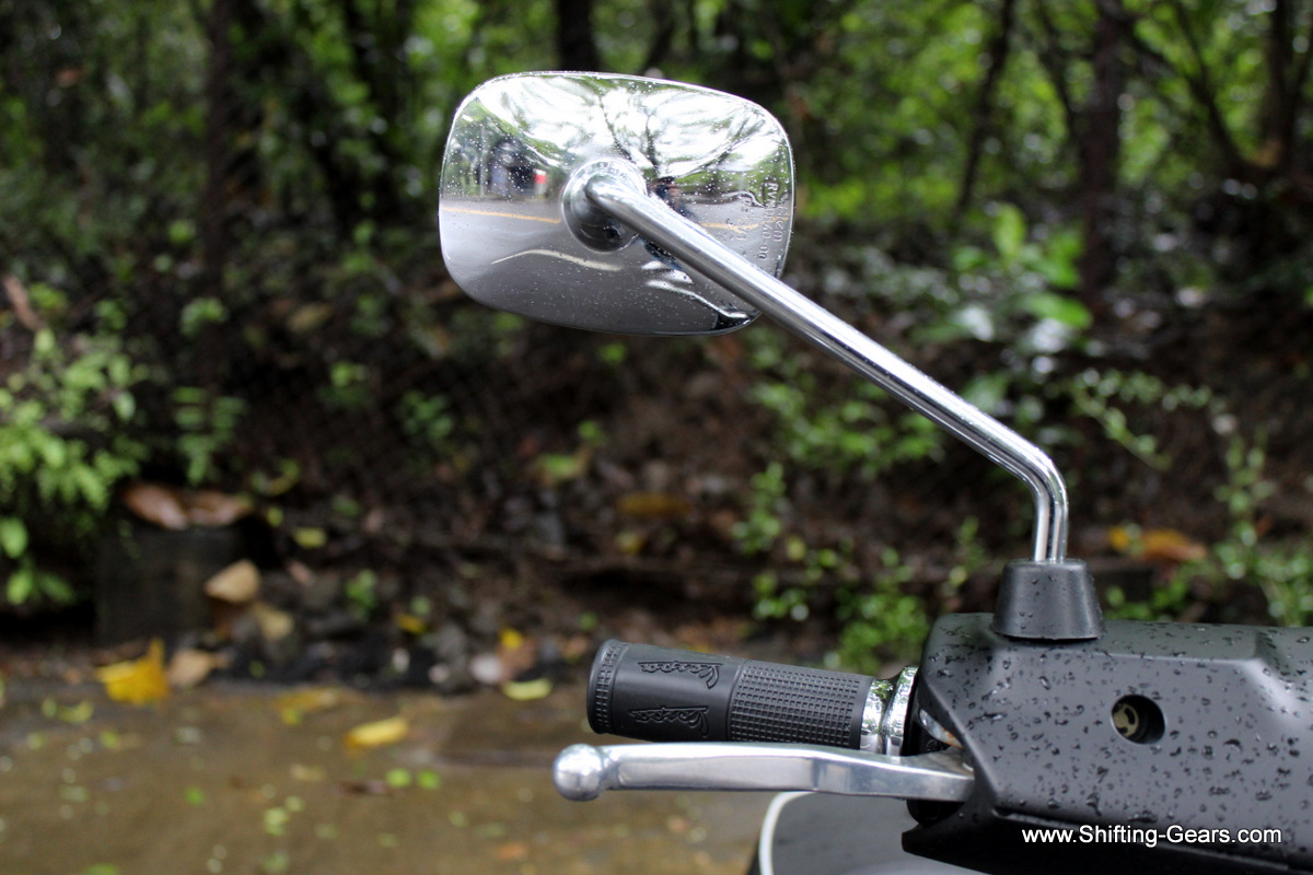 Rectangular rear view mirrors in chrome complement the headlamp