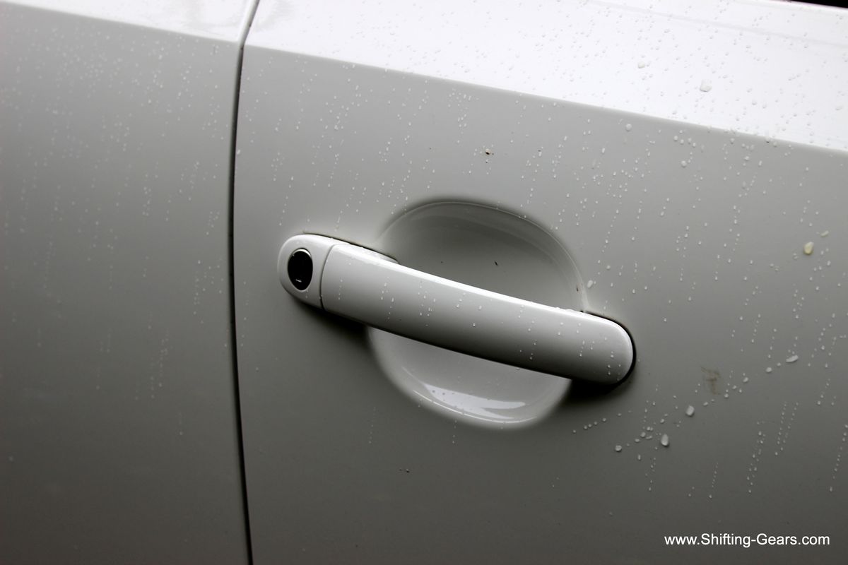 No true keyless entry, you have to unlock the car with the remote. No request sensor on the body coloured door handles.