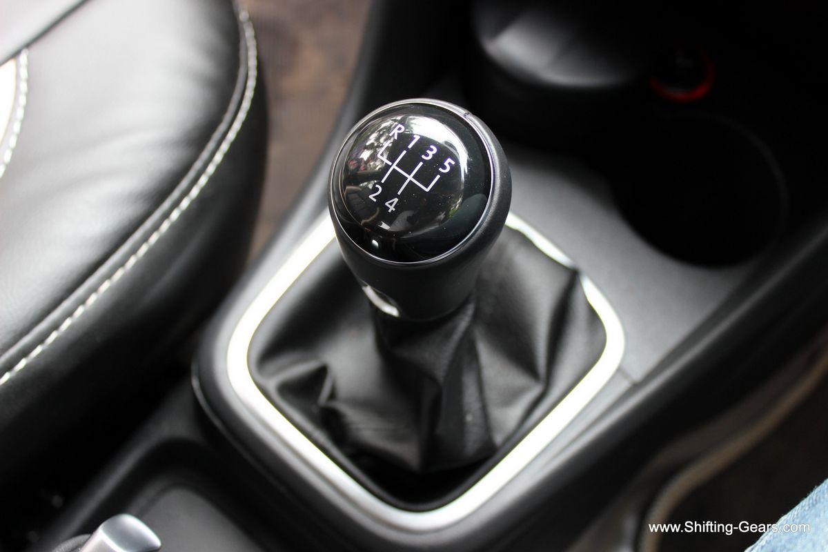 Short gear lever fits in perfectly in your hands and is leather wrapped
