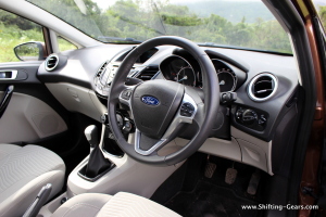 Interior colour scheme has been changed to beige and black as opposed to the previous all-black interiors