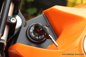 Keyhole is placed below the handlebar, ahead of the fuel tank