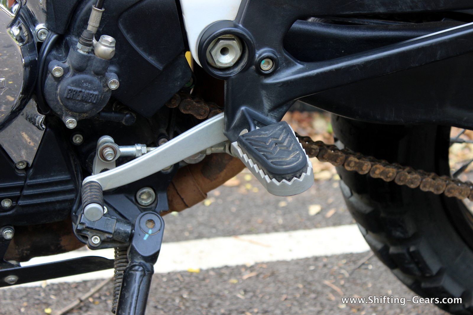 Toothed footpegs suit the bikes rough character